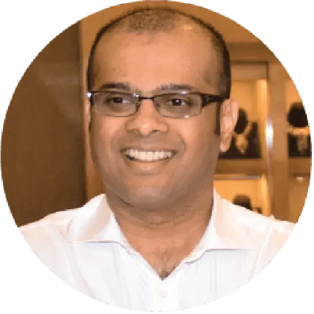 <p style="text-align: justify;"><span style="font-family: Mulish; font-size: 14px;">Ganesh has more than 25 years of domain knowledge, experience and leadership in jewellery retail. He has a Graduate Diploma in Diamonds, Coloured Stones &amp; Gemology from Gemological Institute of America (GIA) coupled with a Finance &amp; Marketing degree from the University of Melbourne &amp; Deakin University in Australia.&nbsp;&nbsp;<a href="https://www.linkedin.com/in/ganeshnarayan?utm_source=share&amp;utm_campaign=share_via&amp;utm_content=profile&amp;utm_medium=ios_app"><img src="https://img.icons8.com/?size=100&amp;id=xuvGCOXi8Wyg&amp;format=png&amp;color=000000" alt="LinkedIn" width="23" height="23"></a></span></p>